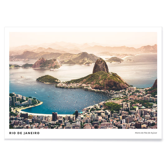 Aerial view of Rio de Janeiro with beaches buildings boats blue waters and mountains including Morro do Pao de Acucar poster artwork, with black aluminium frame on white background