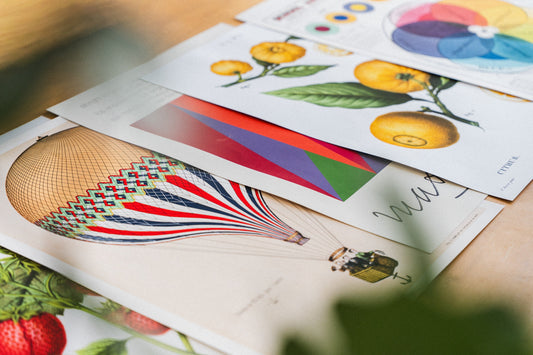 Prints laid out at a Moryarty vintage poster store