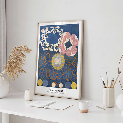 Abstract floral patterns and swirling shapes with vibrant colors on a blue background poster by Hilma af Klint Childhood Group IV, framed and displayed in home decor