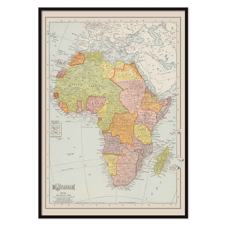 Rand McNally and Company Africa Map vintage poster of the African continent in muted green yellow pink and beige tones, with black aluminium frame on white background