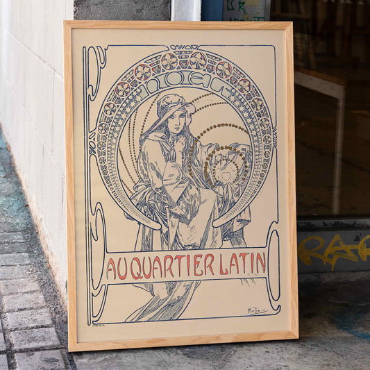 Alphonse Mucha Au Quartier Latin poster, graceful woman in Art Nouveau linework, beige and blue tones, framed and displayed in home decor