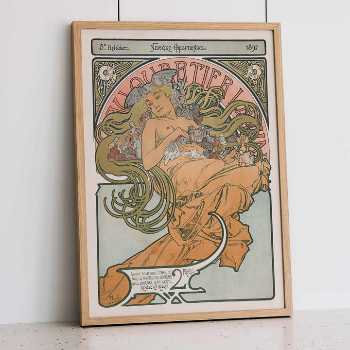 Alphonse Mucha Au Quartier Latin poster with elegant woman and flowing floral tendrils in soft peach green and cream tones, framed and displayed in modern living room decor