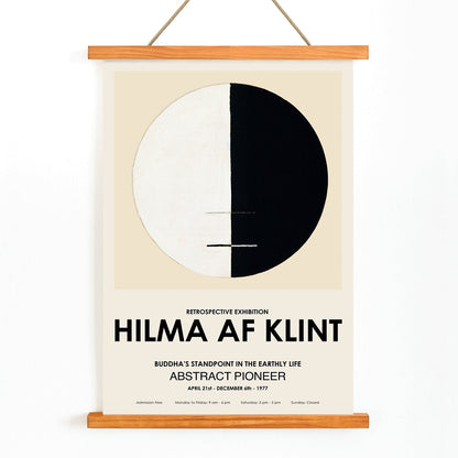 Exhibition poster Buddhas Standpoint in the Earthly Life by Hilma Af Klint featuring abstract black and white circle design artwork, with wooden magnetic frame on white background