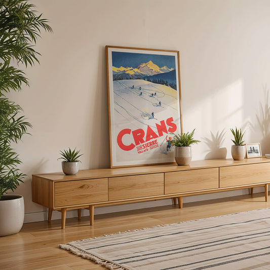 Crans sur Sierre Switzerland Ski Poster by Martin Peikert with skiers descending snowy mountain slopes and vibrant mountain backdrop, framed and displayed in home decor
