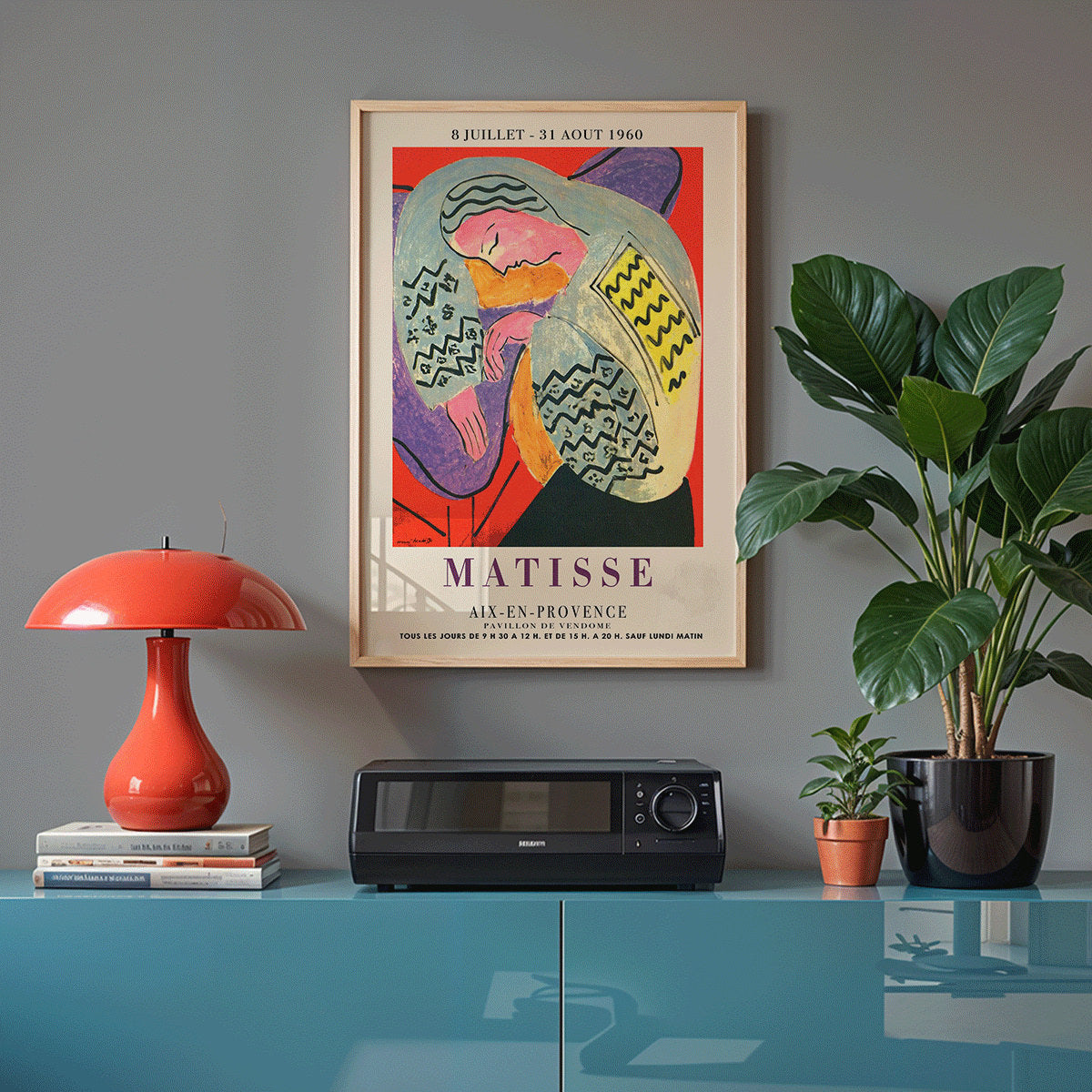 Henri Matisse The Dream exhibition poster at Aix en Provence featuring colorful abstract design with reclining figure, framed and displayed in home decor