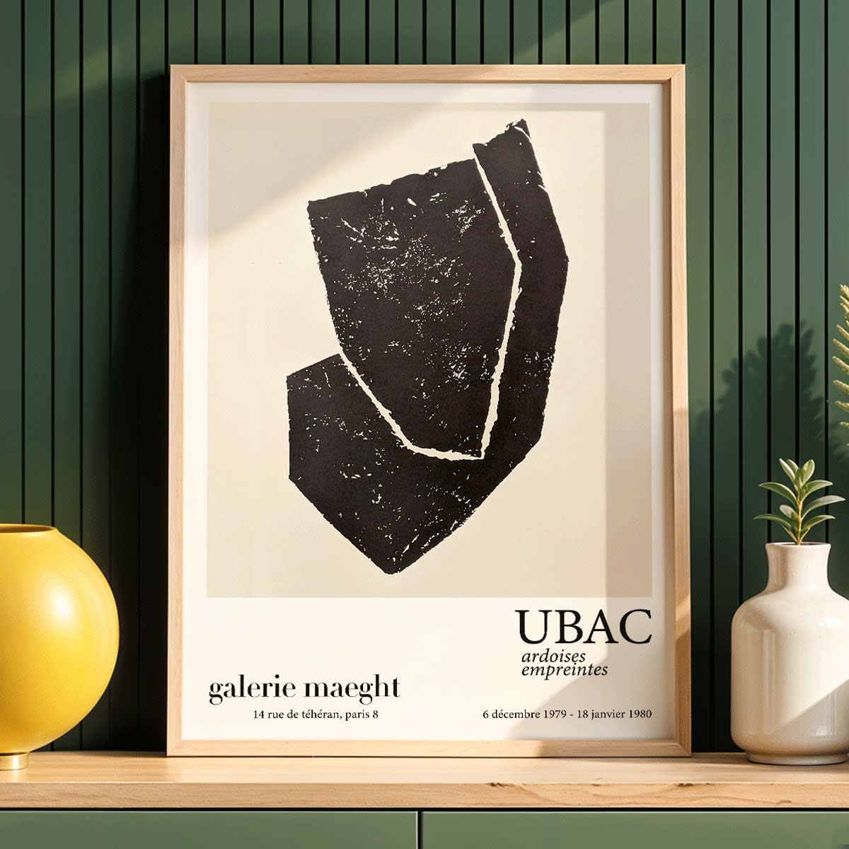 Ardoises Empreintes exhibition poster by Raoul Ubac featuring black abstract shapes and design on white from Galerie Maeght Paris, framed and displayed in home decor