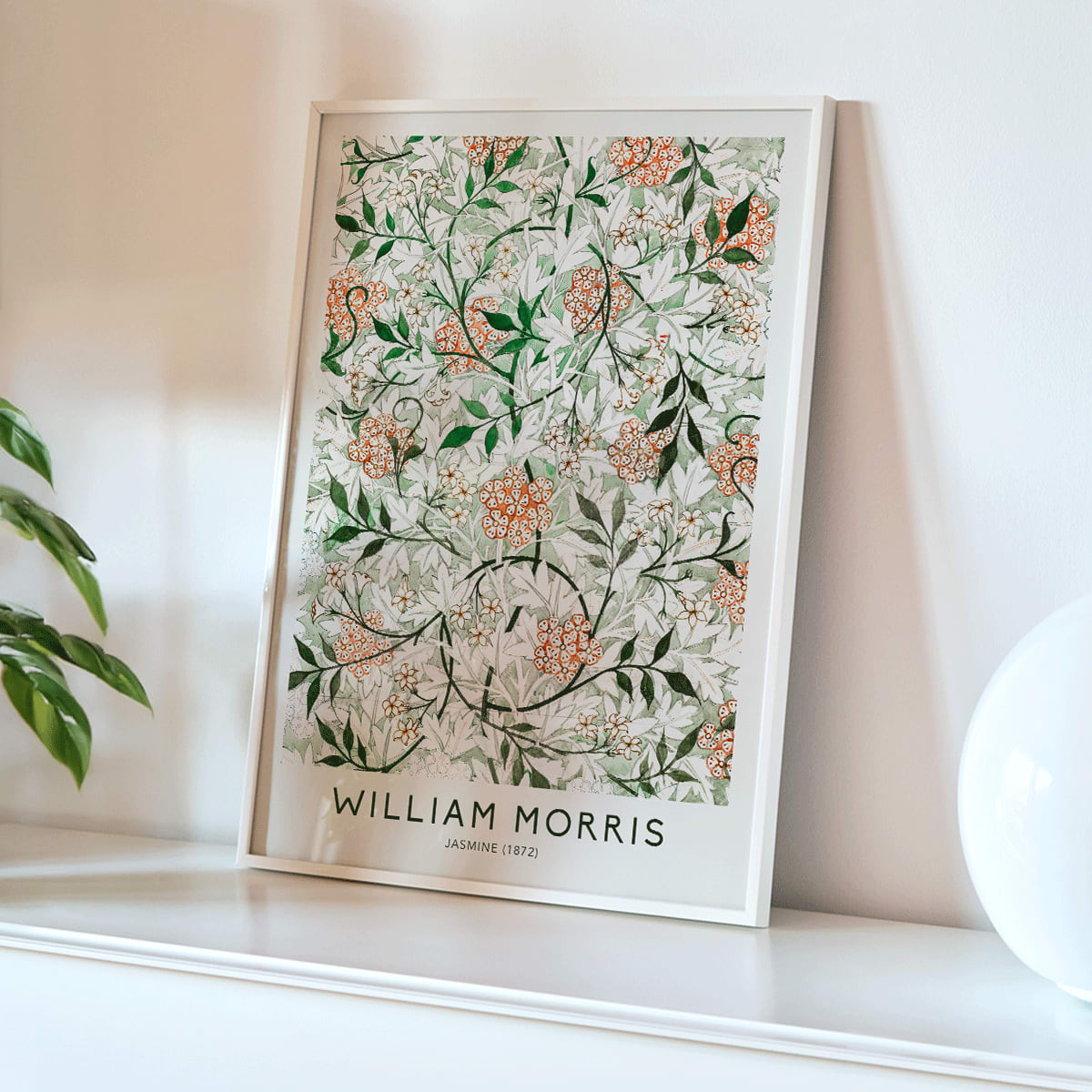 Floral botanical pattern of jasmine flowers and green orange leaves by William Morris artwork poster, framed and displayed in home decor