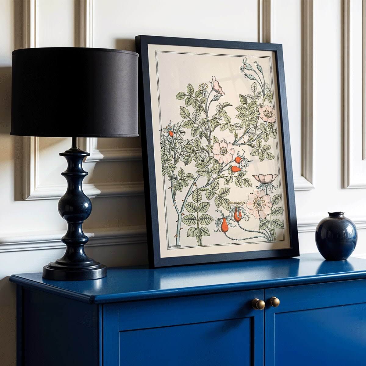 Floral poster of roses and leaves by Maurice Pillard Verneuil titled Eglantier with intricate pastel patterns, framed and displayed in modern living room decor