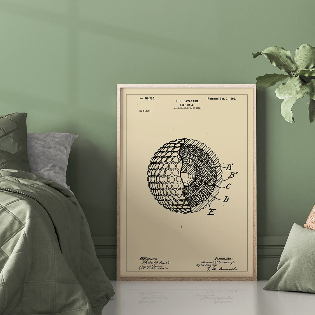 Golf ball patent technical drawing by R B Cavanagh showing detailed labeled interior structure and design elements, framed and displayed in home decor