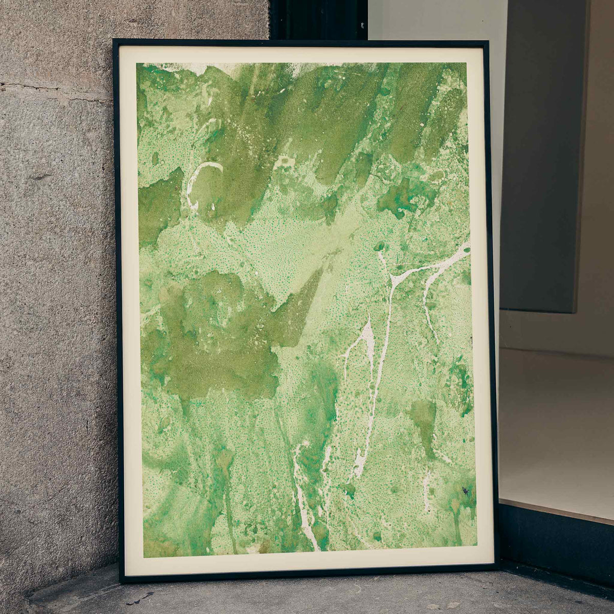 Margarete Rumpf Green marbled paper poster with swirling green and pale beige abstract textures vertical composition, framed and displayed in home decor