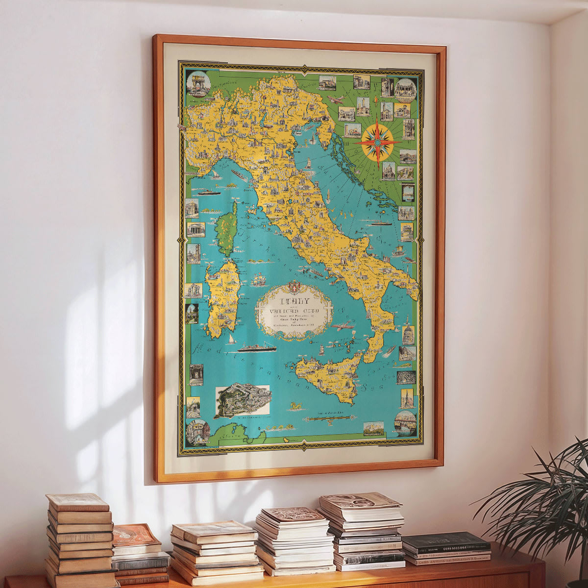 Map of Italy and Vatican City by Ernest Dudley Chase illustrated poster with colorful landmarks and detailed design, framed and displayed in modern living room decor