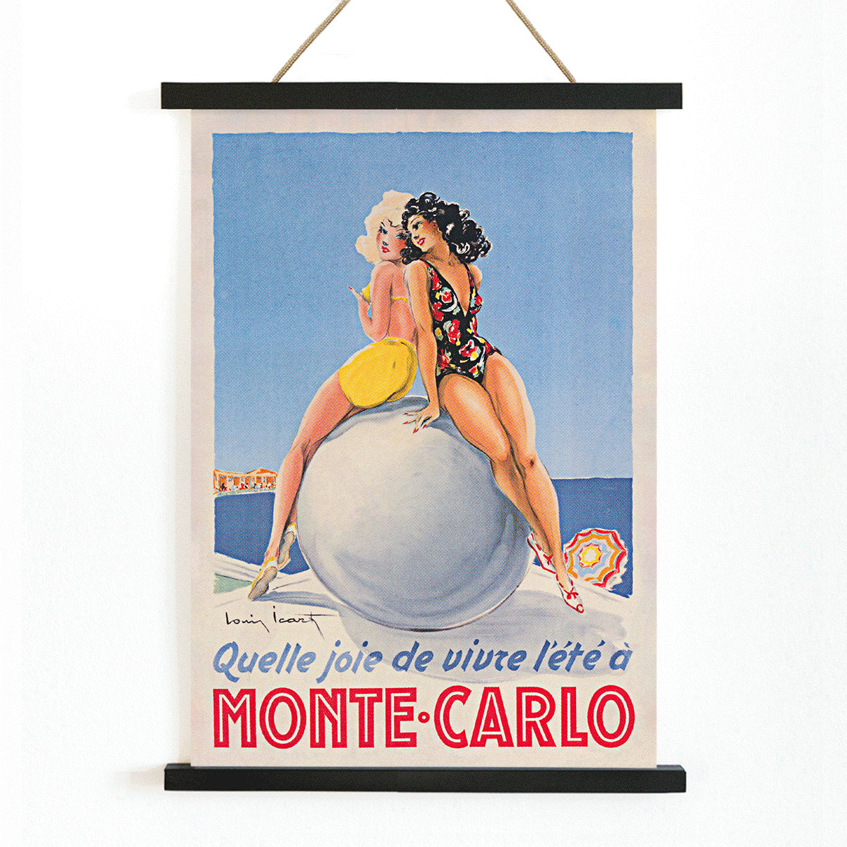 Monte Carlo artwork by Louis Icart showing two women in swimsuits sitting on a large ball at the beach poster, with wooden magnetic frame on white background