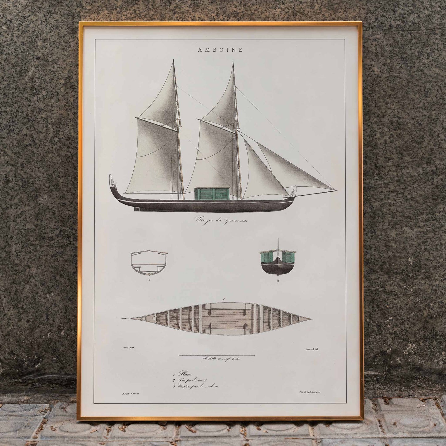 Amboine by J Tastu minimalist sailing ship poster with detailed hull and sail diagrams in soft beige tones, framed and displayed in home decor