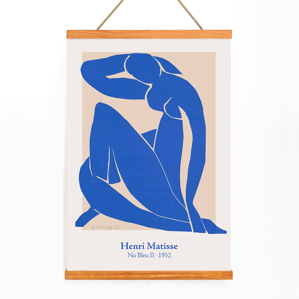 Nu Bleu II by Henri Matisse blue abstract figure art print poster on beige background framed, with wooden magnetic frame on white background