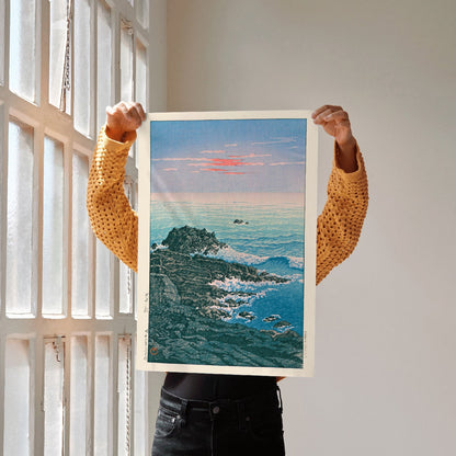 Morning at Cape Inubo by Kawase Hasui seascape with waves crashing on rocky shore at sunrise coastal scene poster, framed and displayed in home decor