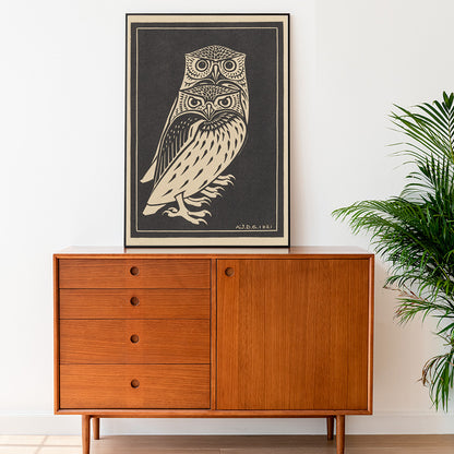 Stylized black and white owls artwork by Julie de Graag titled Two black and white owls illustration and poster, framed and displayed in home decor