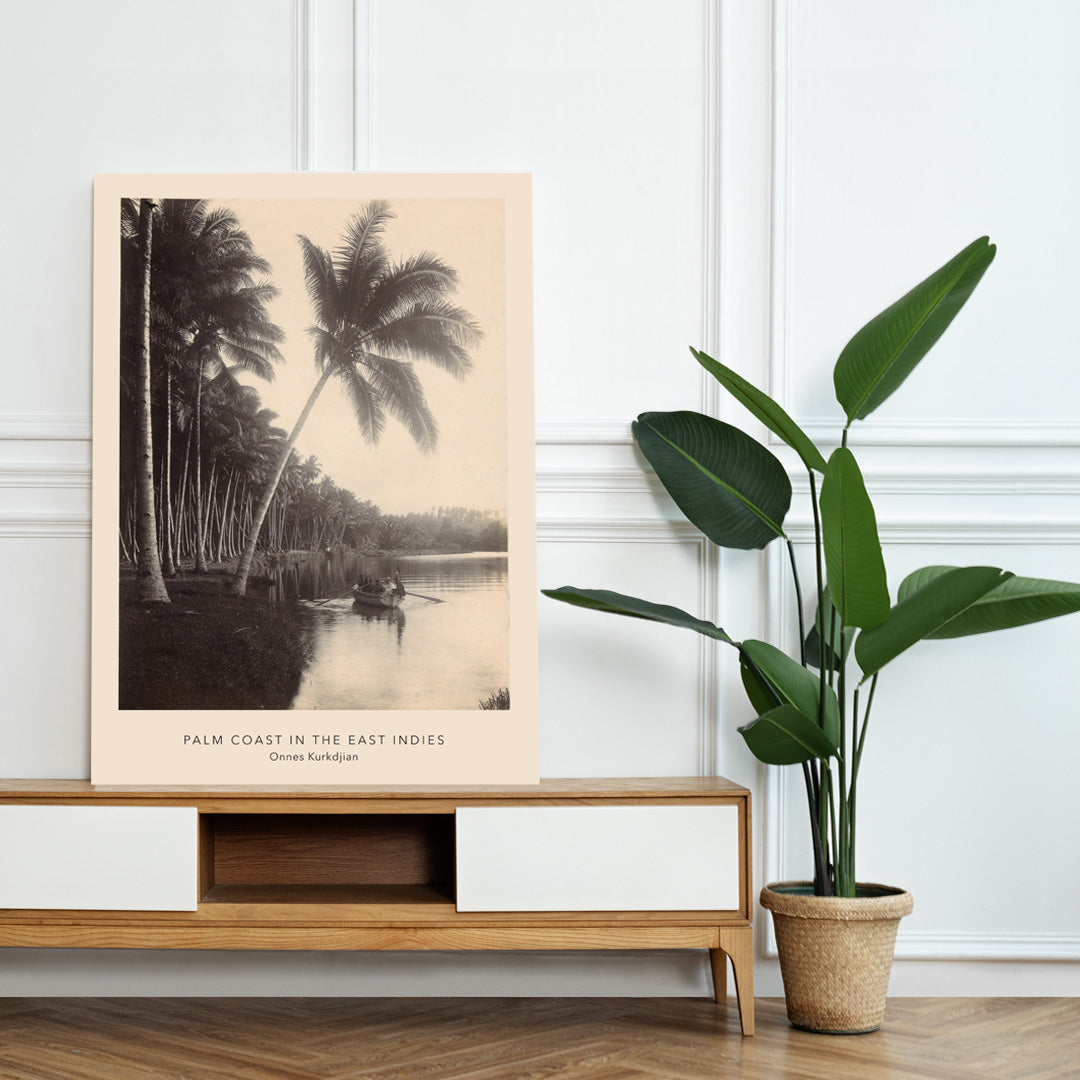 Palm trees and rowboat on river scenic landscape Palm Coast East Indies artwork by Onnes Kurkdjian poster, framed and displayed in home decor