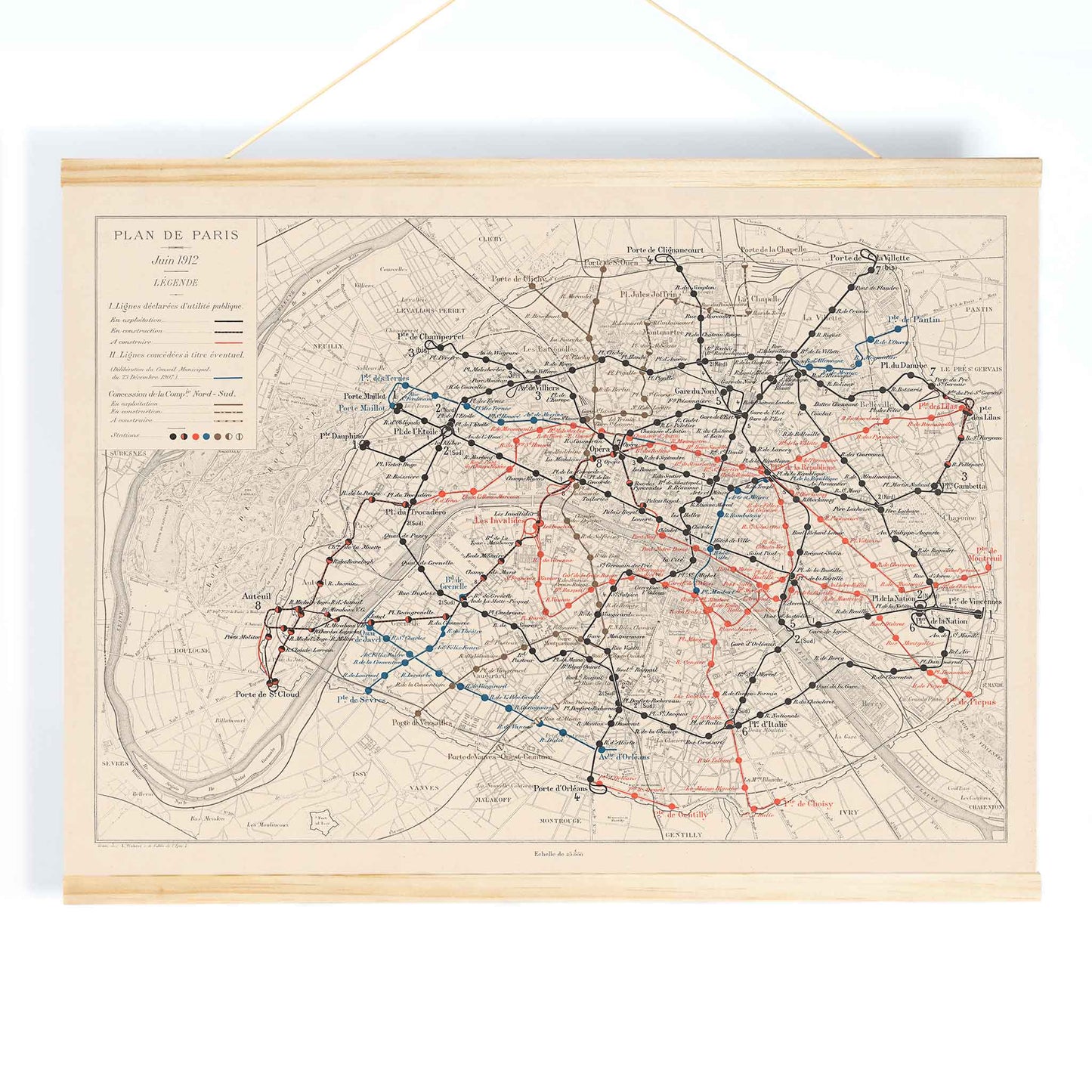 Louis Wuhrer Paris metro map poster vintage city plan with black and red rail lines, with wooden magnetic frame on white background
