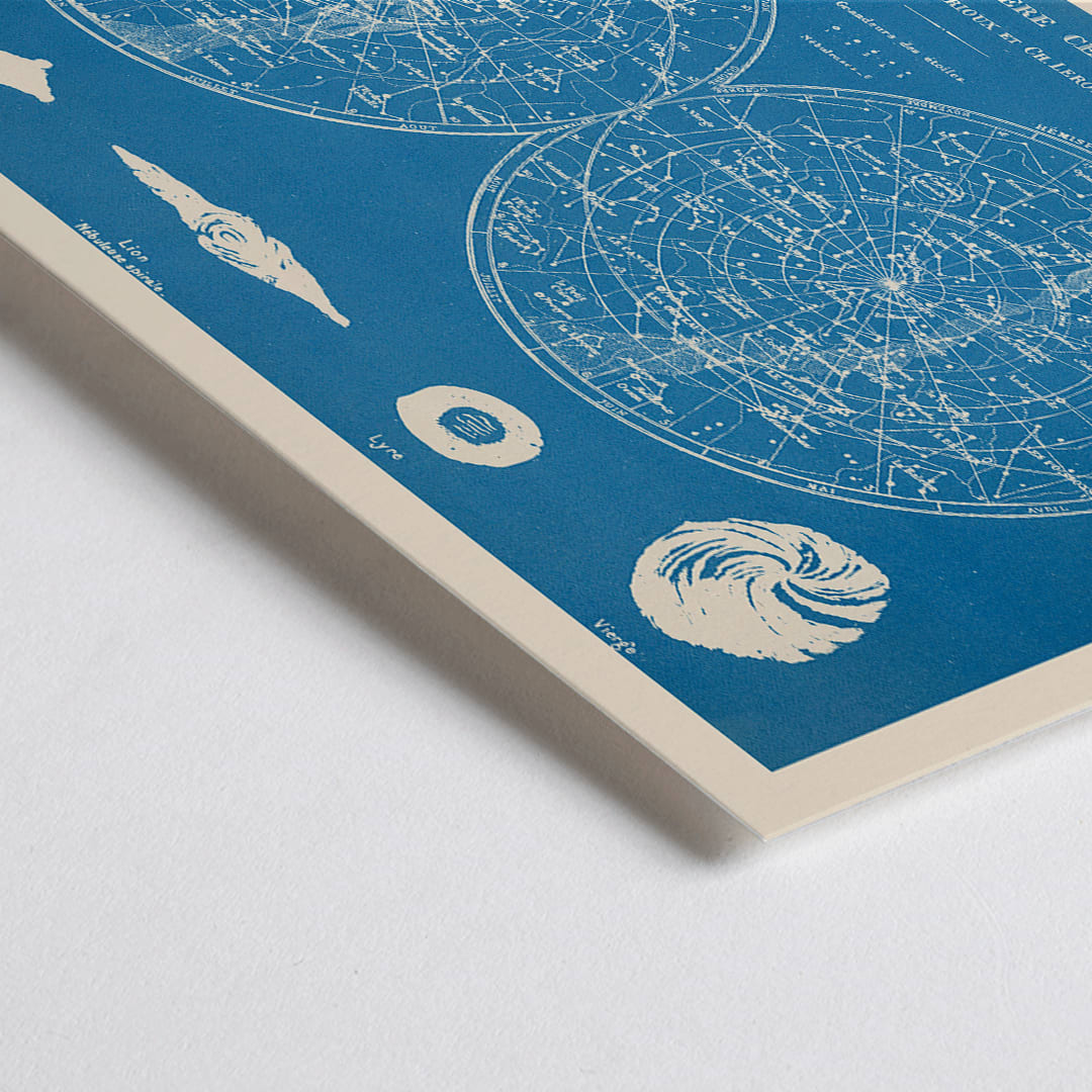 Closeup detail of Celestial planisphere star map poster by Claude Joseph Drioux featuring constellations and astronomical illustrations on blue background