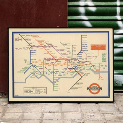 Vintage London Underground map artwork by London Transport featuring colorful lines and station names in a classic design, framed and displayed in home decor