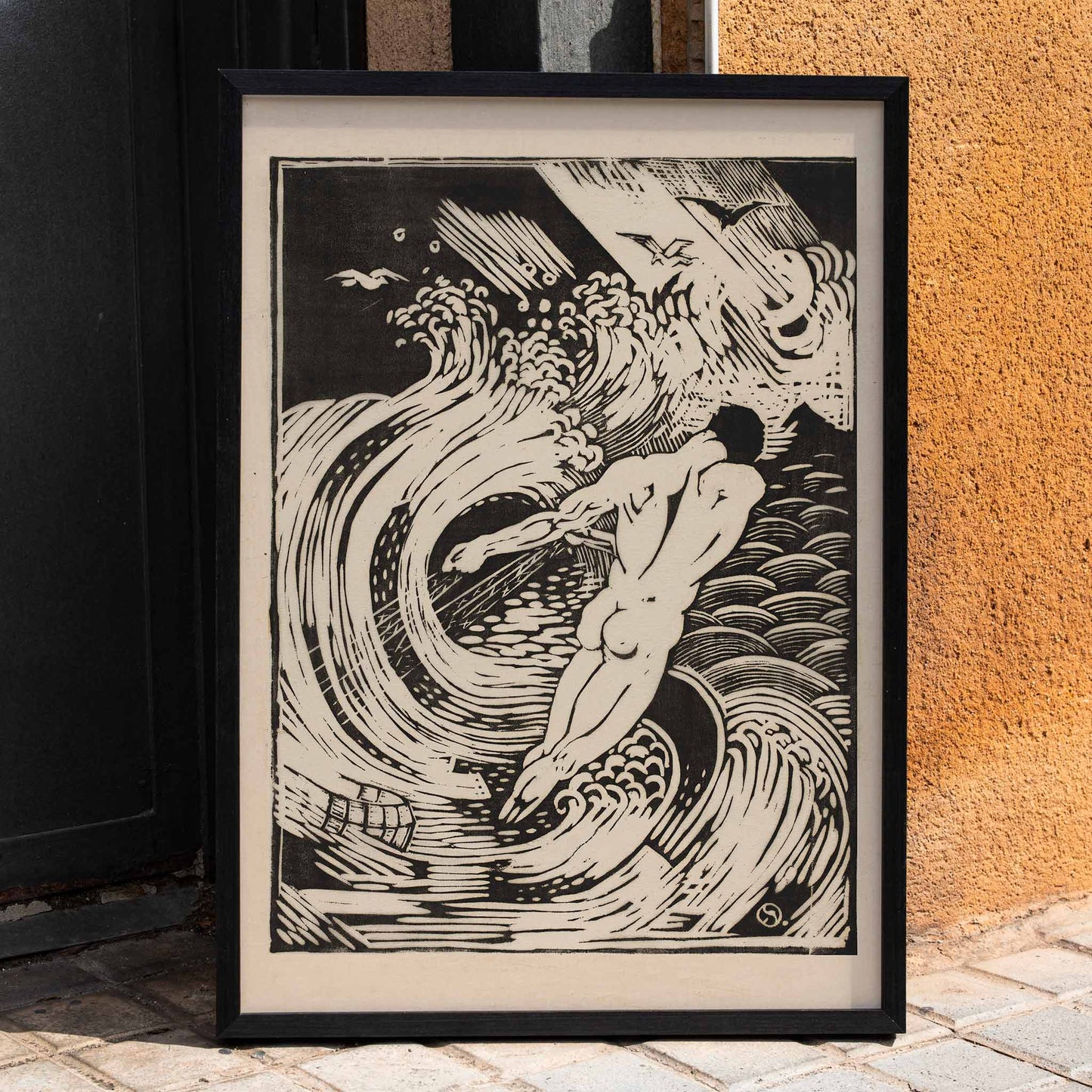 Nude male diving into swirling stormy waves in De visscher by Henri van der Stok poster, framed and displayed in home decor