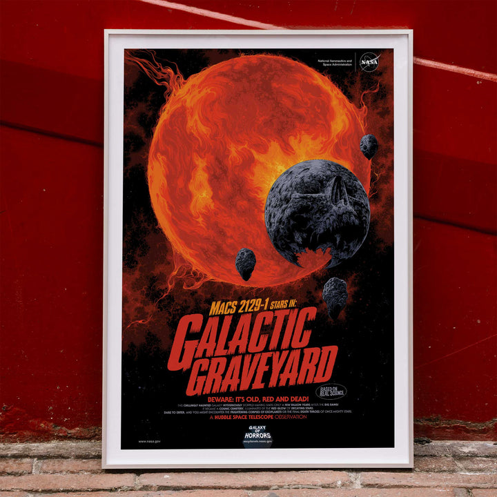 Fiery red star and dark planetary debris in space from Galactic Graveyard by NASA wall art poster for home decor, framed and displayed in home decor