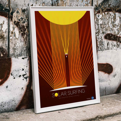 Solar Surfing by NASA poster featuring a stylized spacecraft surfing solar flares from a bright yellow sun with orange rays and geometric design, framed and displayed in home decor