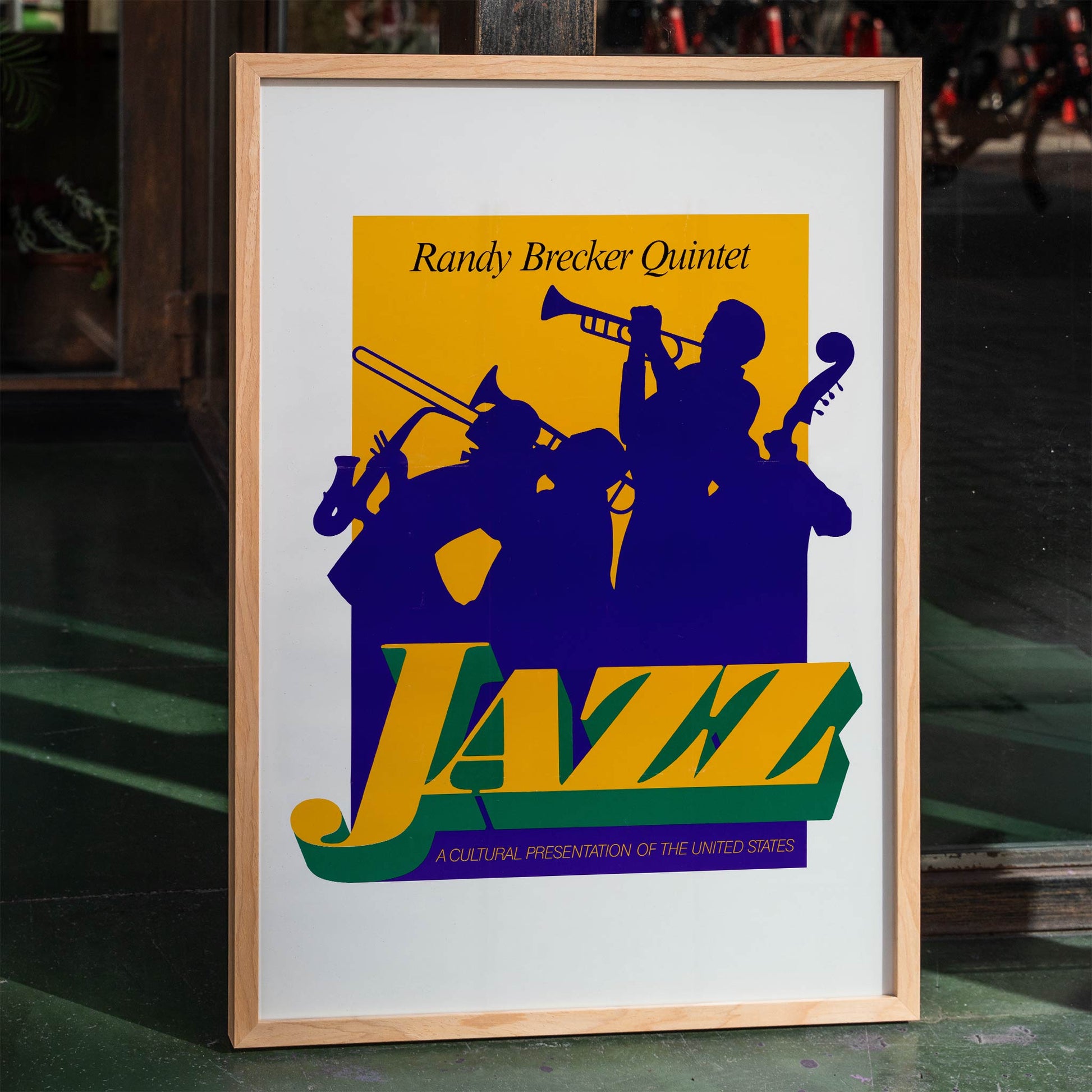 Randy Brecker Quintet jazz poster artwork by US Information Agency featuring silhouetted musicians playing instruments and showcasing cultural art, framed and displayed in home decor