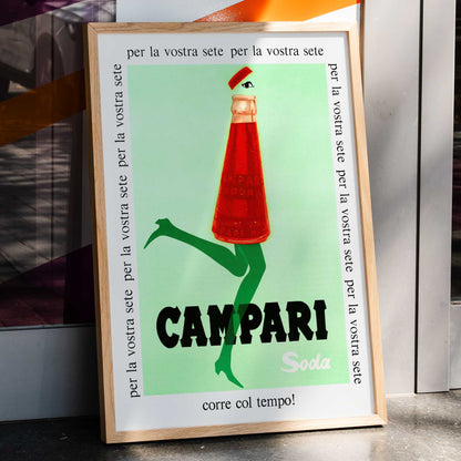 Campari Soda advertising posters by Franz Marangolo and Leonetto Cappiello featuring stylized bottles with green legs and walking on a green background, framed and displayed in home decor