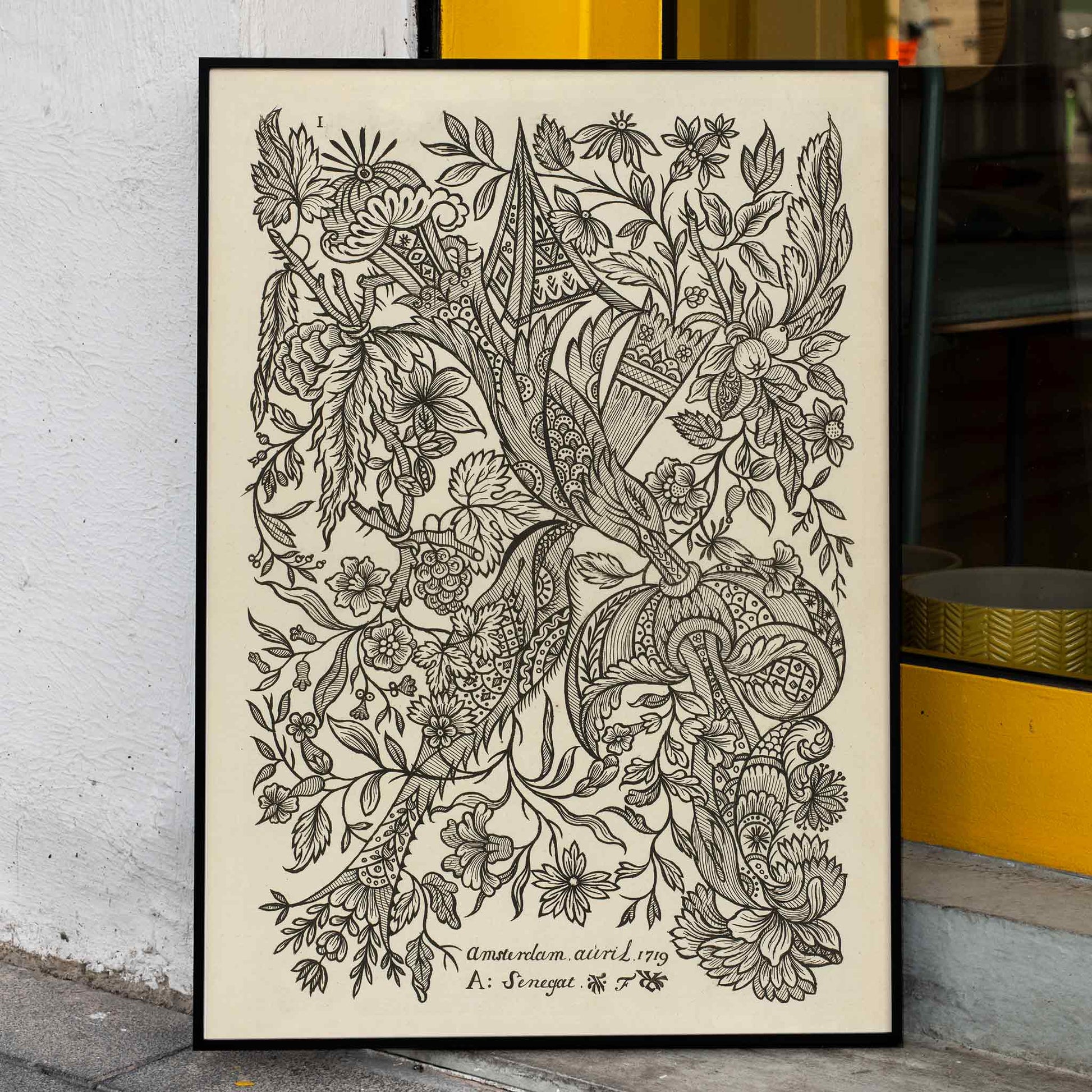 Intricate black and white floral textile pattern artwork poster by Alexander Senegat, framed and displayed in home decor