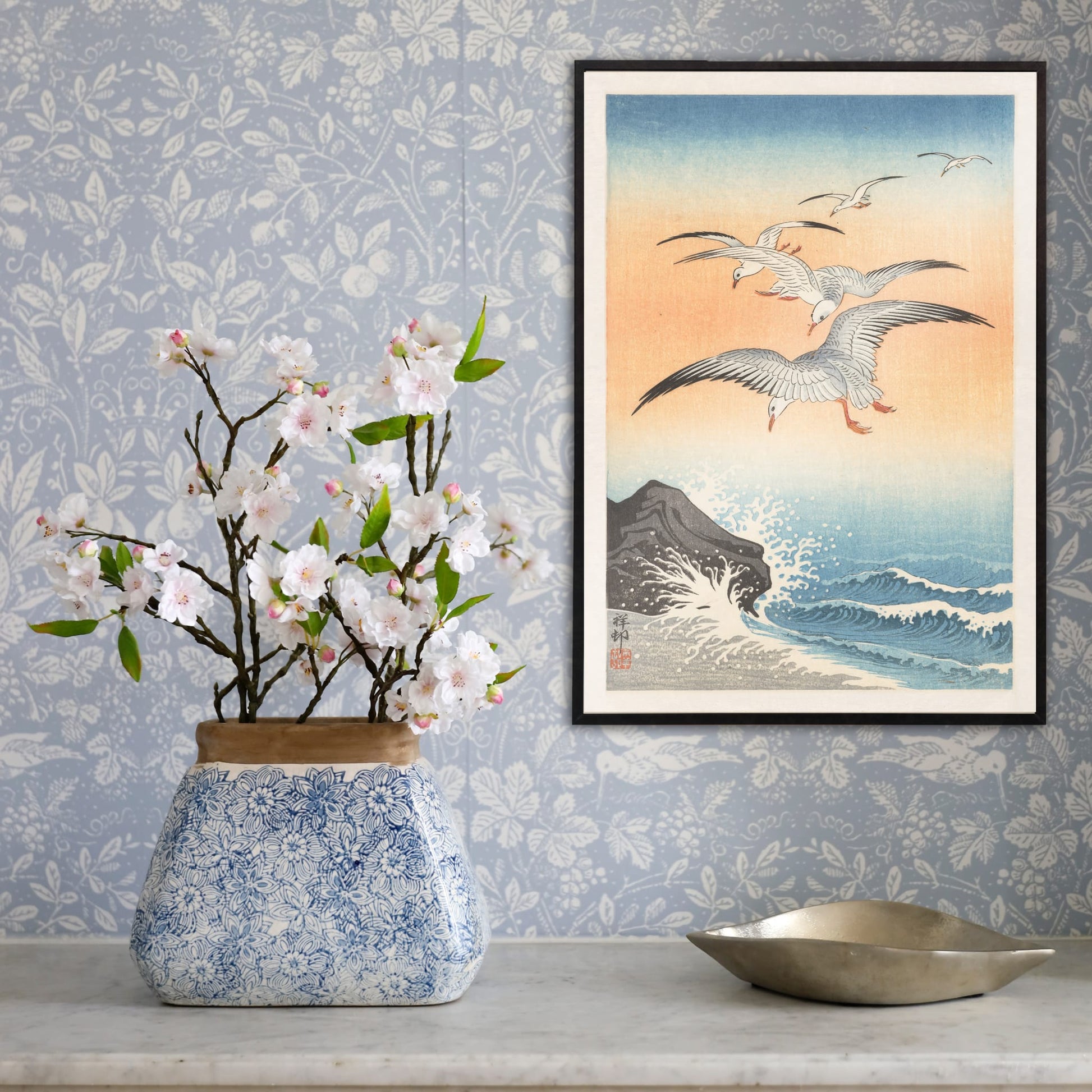 Five seagulls flying over turbulent sea with waves and rocky shore artwork by Ohara Koson, framed and displayed in home decor