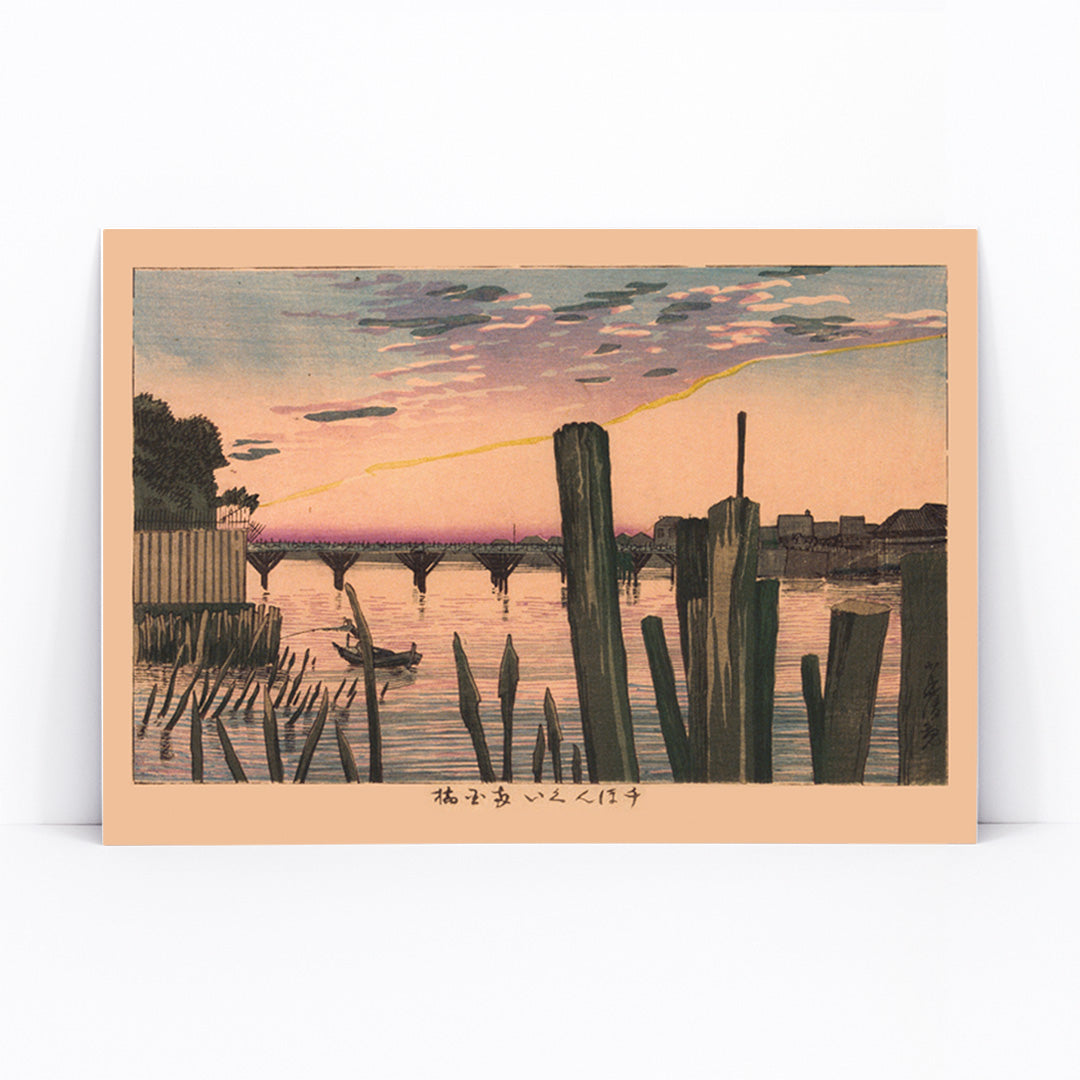 Scenic river sunset with wooden stakes and Ryogoku Bridge by Kobayashi Kiyochika Japanese art poster, framed and displayed in modern living room decor