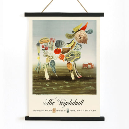 The Vegetabull by Lewitt-Him painting and poster showing a bull made of vegetables on grass background, with wooden magnetic frame on white background