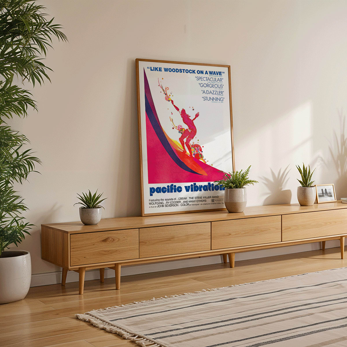 Pacific Vibrations surfing documentary poster by John Severson featuring colorful surfer illustrations and a surfer riding a wave, framed and displayed in modern living room decor